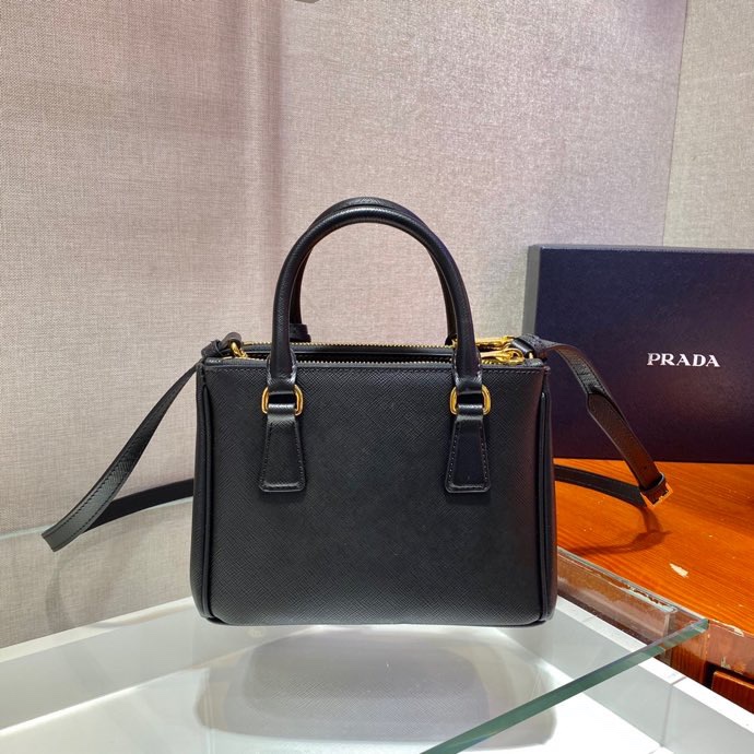 Pra*a top handle bags